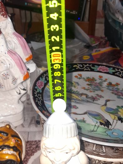 Old Ornament of a Boy in a Winter Hat and Light Colored Clothing on Skis, Made in Spain.