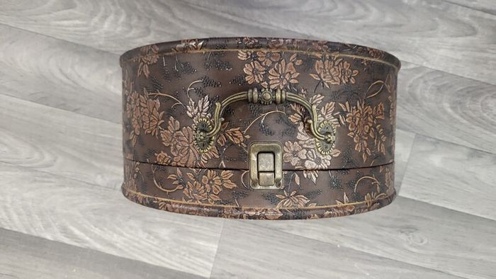 Vintage  embossed  hat  boxes