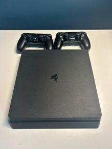PlayStation 4 with 2 controllers, preloaded games and original box