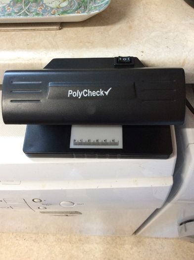 Polycheck Bank Note Checker. 9 Watts Ultra Violet Bank Note Checker.