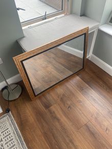 Large gold and black mirror