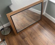 Large gold and black mirror