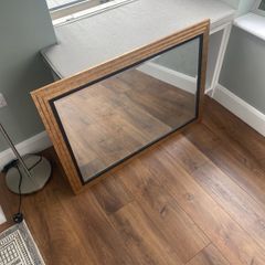 Large gold and black mirror