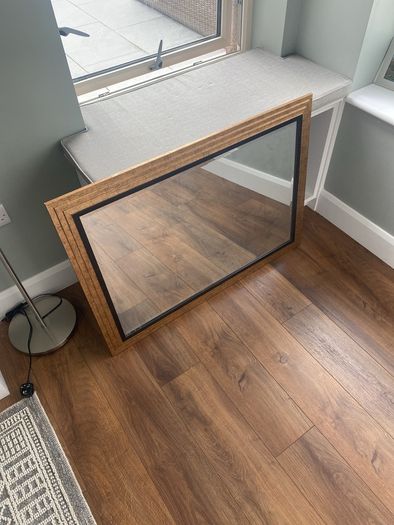 Large gold and black mirror