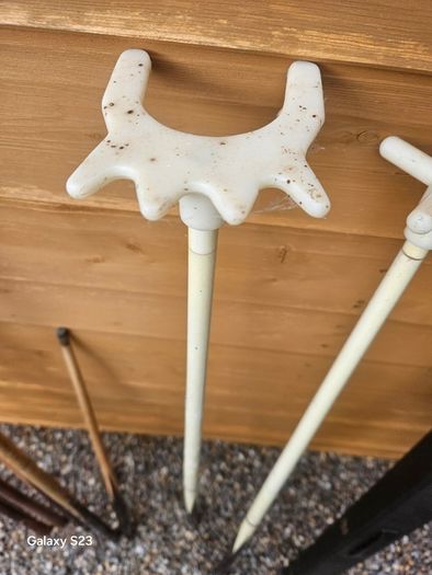 Pool cues, bridge, rest and case.