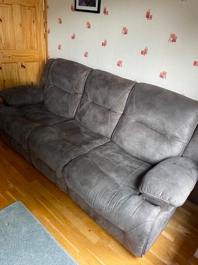 Three seater reclining sofa
