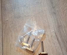 Compensated telecaster brass saddles