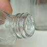 495 - Set of 6 Vintage Clear Glass Screw Cork Top Collectible Decorative Bottles and Jars Image 7