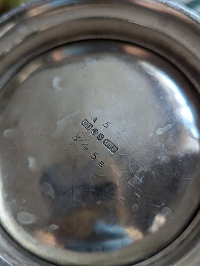 Silverware antique teapot