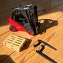 Bruder Linde H30D Forklift with Trailer Coupling and 2 Pallets scale 1:16 Image 7