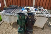 A selection of Golf clubs. Bags and golf balls.