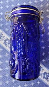 Neiman Marcus Vintage cobalt blue glass storage canister featuring an embossed fruit pattern