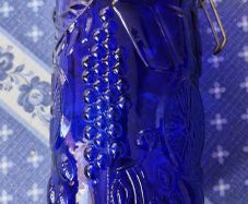 Neiman Marcus Vintage cobalt blue glass storage canister featuring an embossed fruit pattern