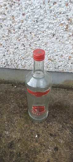 Smirnoff volka 3 litre bottle ,,with cork ,nice patina condition, handy for 1 or 2 euro coins ,etc ,,or display advertising item for home bar etc ,sold as is,
