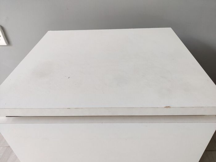 White bedside table