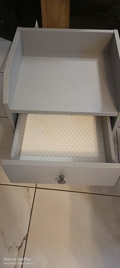 Grey bedside locker from Ikea
