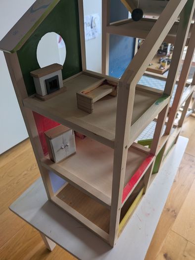 Much loved Hape Wooden Dolls House