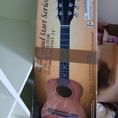 Little girls pink Guitar