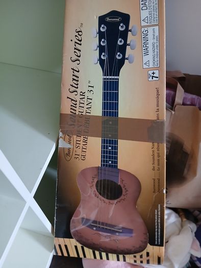 Little girls pink Guitar