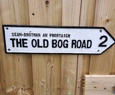 The old bog road cast iron sign
