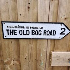 The old bog road cast iron sign
