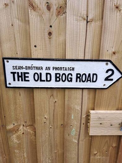 The old bog road cast iron sign