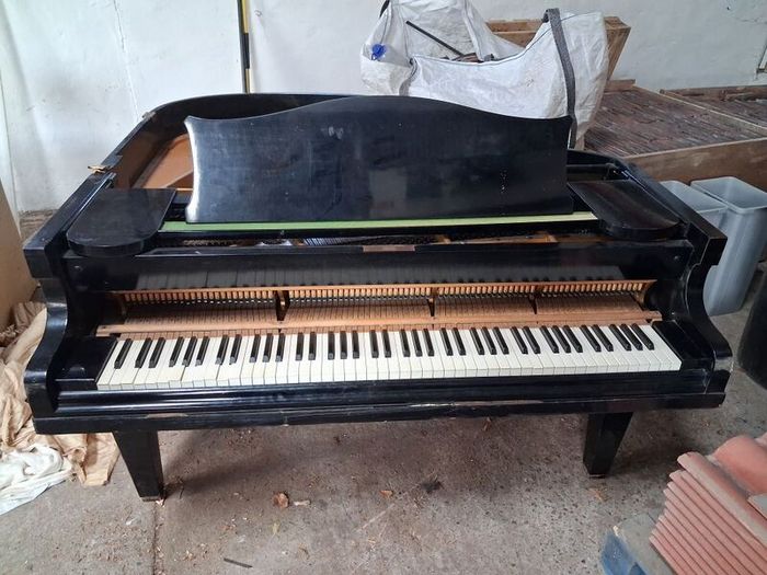 C. Bechstein baby grand piano