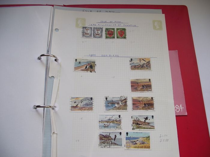 A collection of stamps from Isle of Man and Israel on albums pages (1950-1998) in the binder
