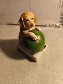 Vintage  Puppy Figurine Holding a ball on marble plinth