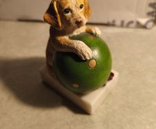 Vintage  Puppy Figurine Holding a ball on marble plinth