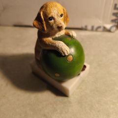 Vintage  Puppy Figurine Holding a ball on marble plinth