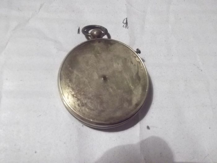 a  antique pocket compass  working
