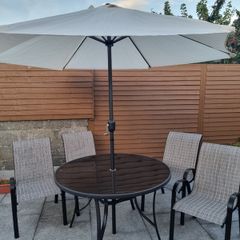 Garden table and chairs set with parasol