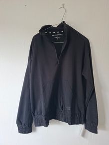 Helen Steele Woven Pocket Sweatshirt.