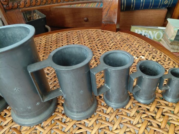 Antique French solid pewter measuring tankards Fleurs de lys complete set