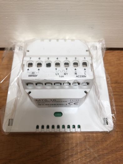 Chrome/Stainless Programable thermostat