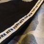 Black stretchy jeans with white stripes, size S, like new Image 2