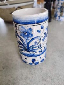 Small blue cup as holder handmade pottery and painted.