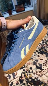 Reebok blue and yellow strip