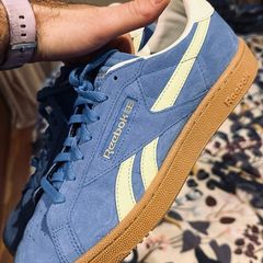 Reebok blue and yellow strip