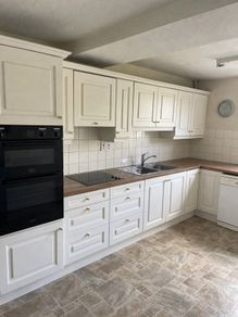 Ivory kitchen with gold handles