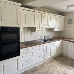 Ivory kitchen with gold handles