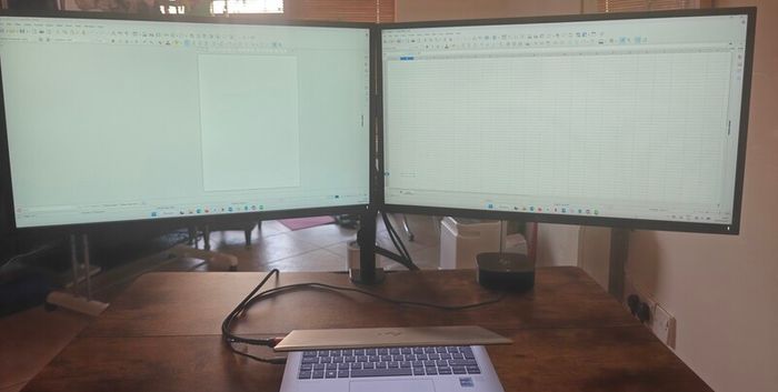 Complete WFH Dual Screen Setup ErGear Electric Sit Standing Desk and includes 2 Dell 27 Monitors HP USB C Dock and HDMI cables