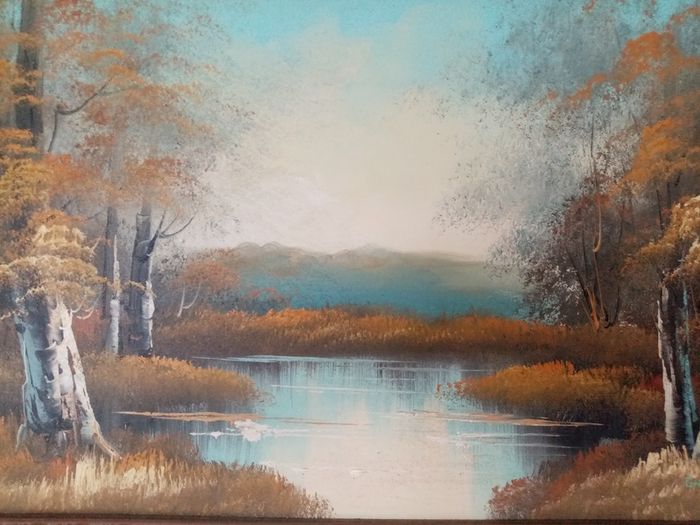 Painting of mountains lake and trees