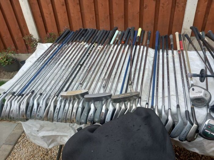 A selection of golf clubs and bags. NOT SELLING SEPARATE