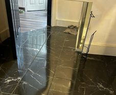 Two frameless mirrors