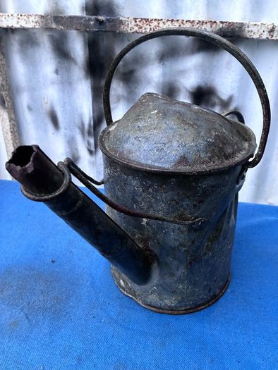 Vintage galvanised watering can