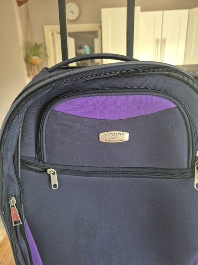 small navy suitcase