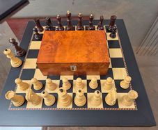 Queen's Gambit chess board and Zagreb pieces