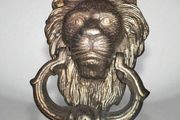 Lions head cast iron door knocker x 2